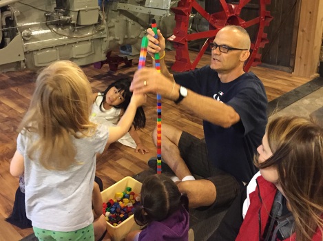 Eric at Tractor Museum with kids