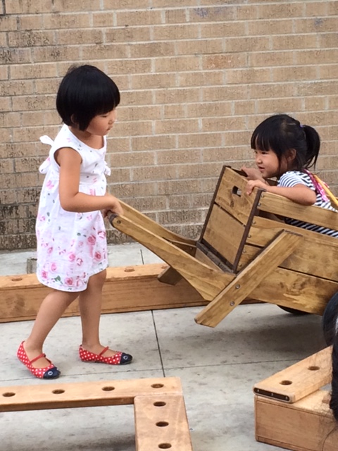 Kids Playing with wheelbarrow