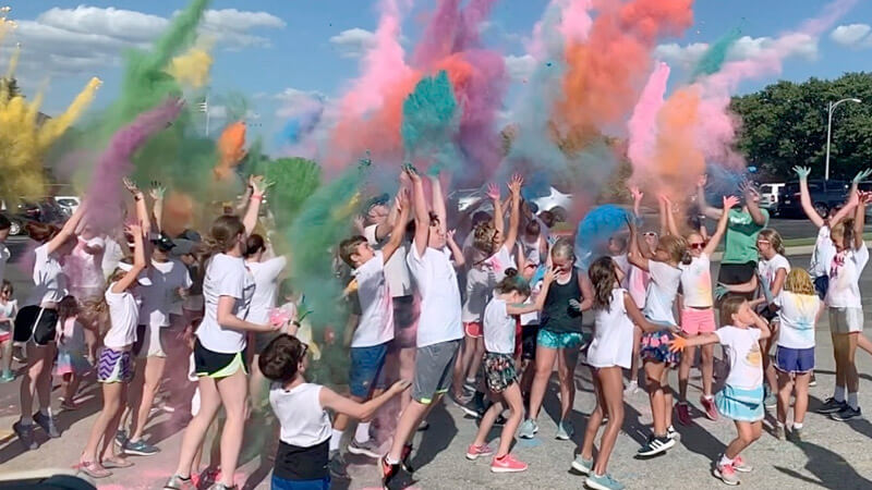 Students celebrating with color run