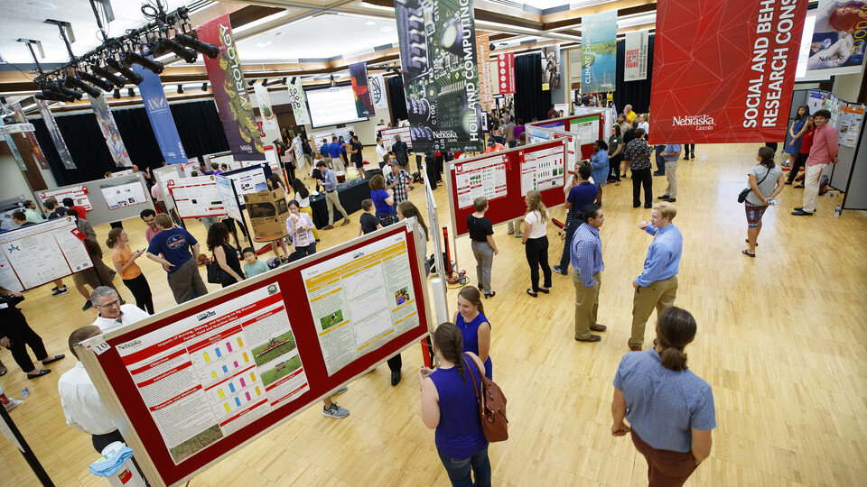 students share their posters during Research Days