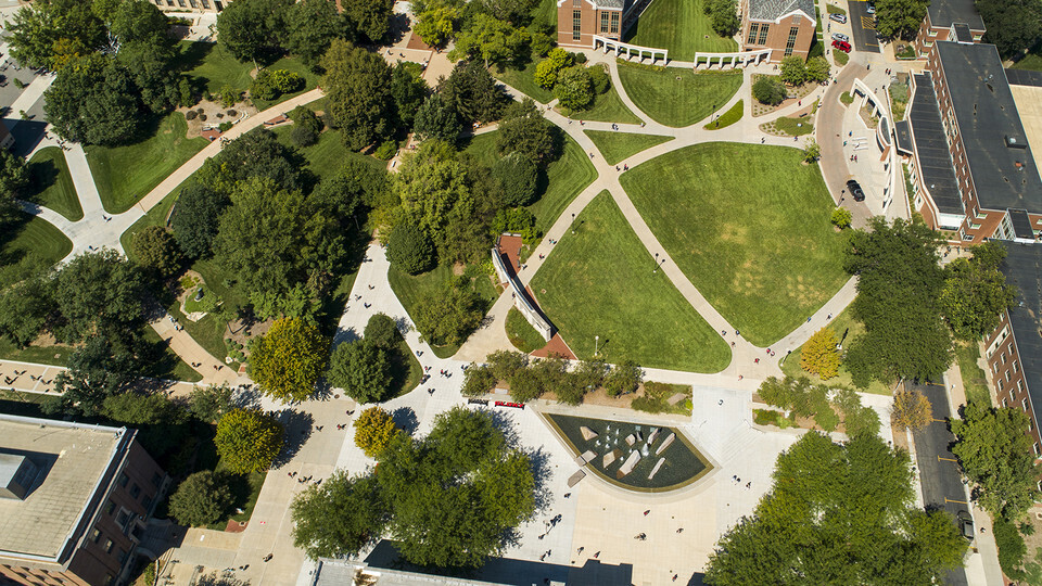 Aerial view of students walking across campus. 