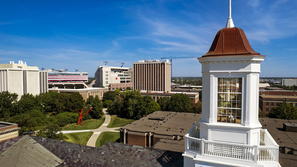 Overhead view of Love Library cupola with campus buildings in the background. 