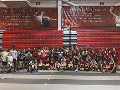 Husker athletes and Everybody Plays Mini Camp participants group photo