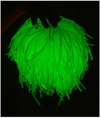 "Healing" handbag glowing green in the dark