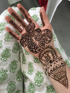 Kara Cruickshank learned about marriage customs as Anubhuti teachers drew Mendhi on her hands.