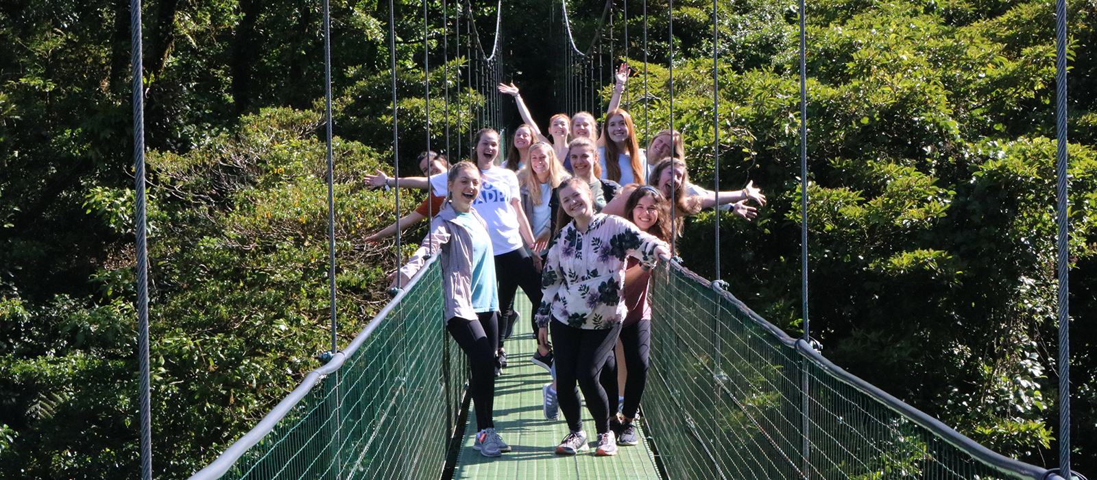 Husker students pose for a photo on a suspension bridge in Costa Rica
