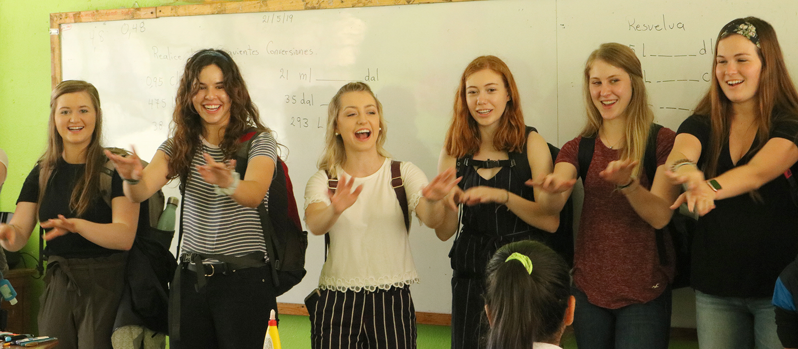 Husker students perform a song at a classroom in Costa Rica