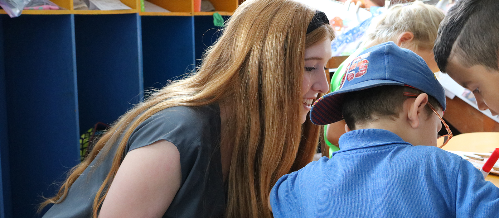 a Husker student works with students at an elementary school in Costa Rica