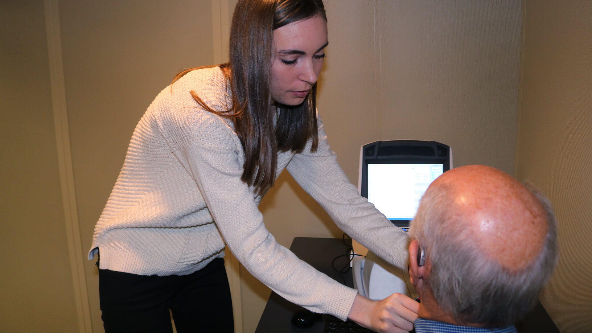 Student working with study participant