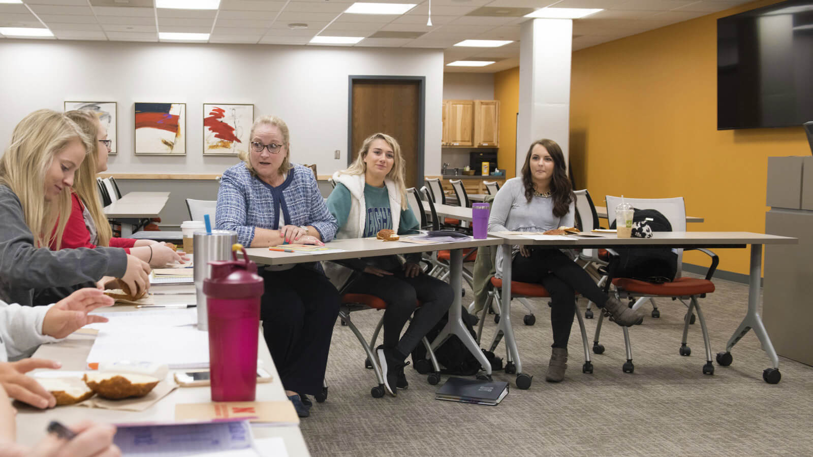 Sherri Moser talks with class.