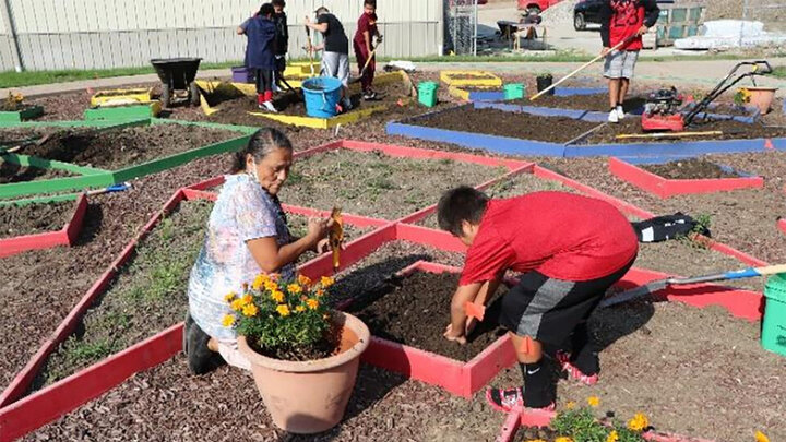 People working in a garden. 