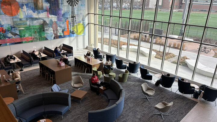 students study in the living room space in Carolyn Pope Edwards Hall