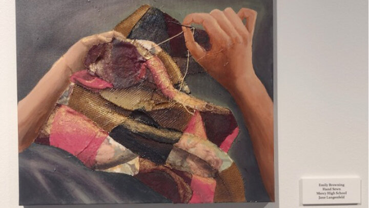 artwork by Emily Browning from Mercy High School titled, "Hand Sewn" on display at the Robert Hillestad Textiles Gallery