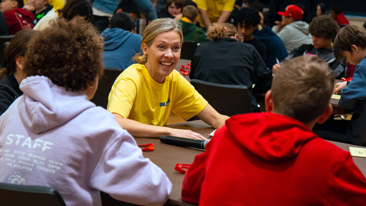 Jillian Harpster, assistant professor of practice in the Department of Teaching, Learning and Teacher Education, chats with students during their May 2024 visit to the University of Nebraska–Lincoln’s city campus. (Kyleigh Skaggs, CYFS)