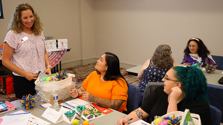 Jaci Foged, Early Childhood Extension coordinator (left), works with educators at a KNEW workshop in Grand Island in August.