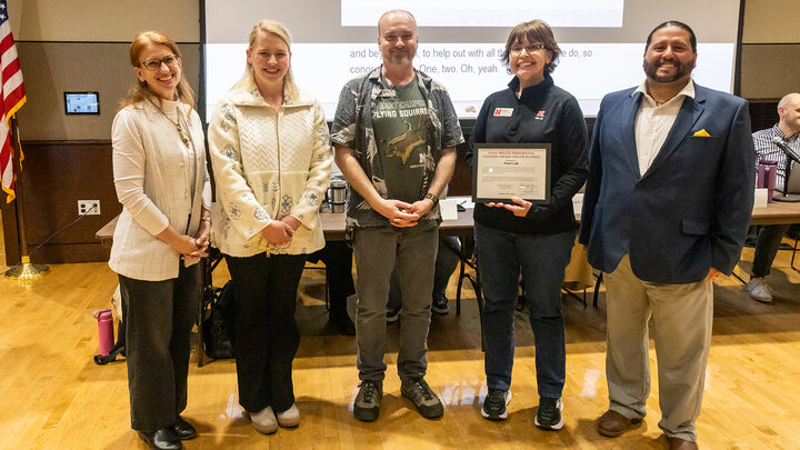 Jessie Brophy, Hilary Butler, Loren Rye, Teri Kaluza and Raul Ochoa stand for a photo during the award presentation