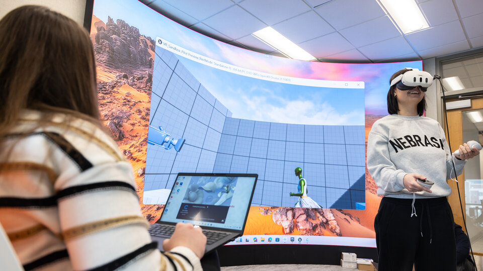 Users experiencing simulations in the VR room.