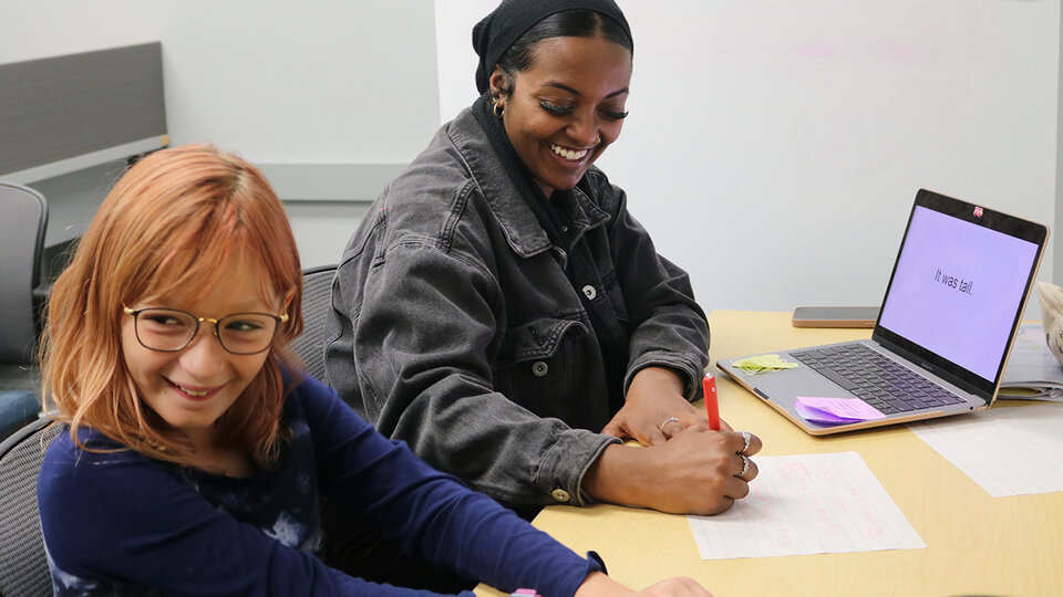 Instructor and student at the reading center.