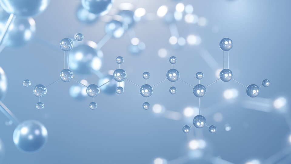 False photo of a molecule where the atoms appear as round water drops.