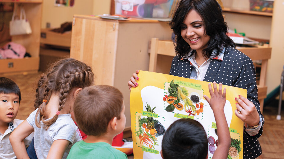 Professor Dipti Dev working with kids on nutrition issues.