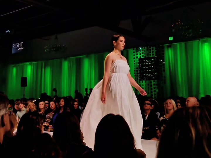 runway show with green lights