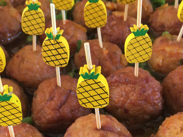 Meatballs with pineapple stick skewers.