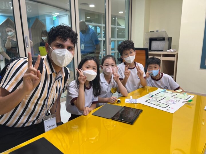 Kids smiling at camera.