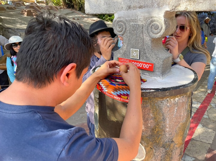 students working around a post