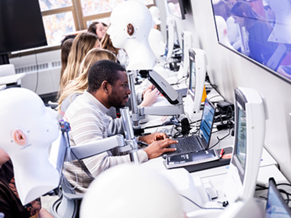 students work on CARL heads in Schmieding Academy for Hearing Healthcare