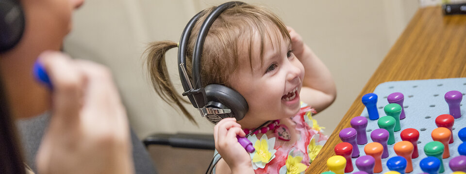 Child wearing headphones