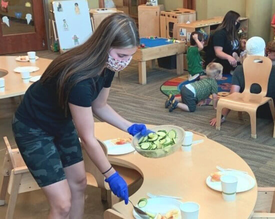 Masked Provider Plating Food