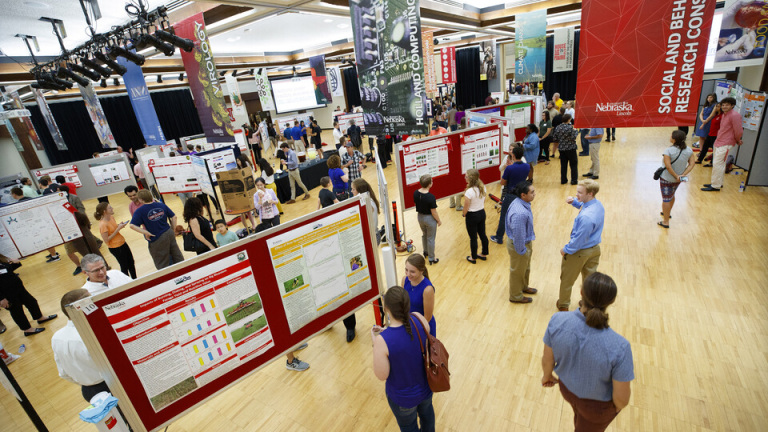 students share their posters during Research Days