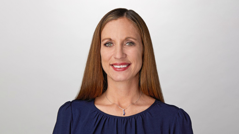 Rachel Jones professional headshot with whitish-gray background