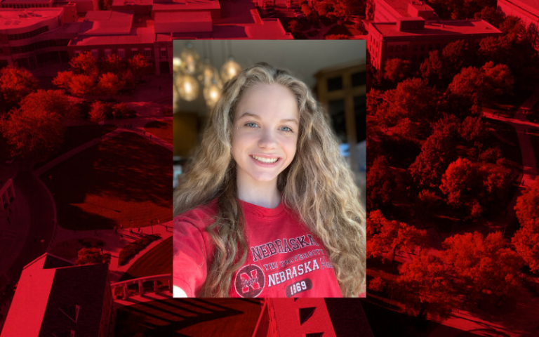 Selfie of Payton Grove wearing a red Nebraska t-shirt. 